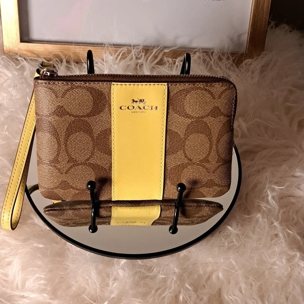 Coach NWTs Signature PVC Corner Zip Wristlet